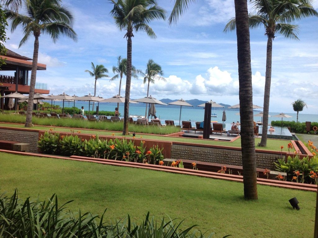The view over the manicured lawns and gardens to the pool area at Hansar.